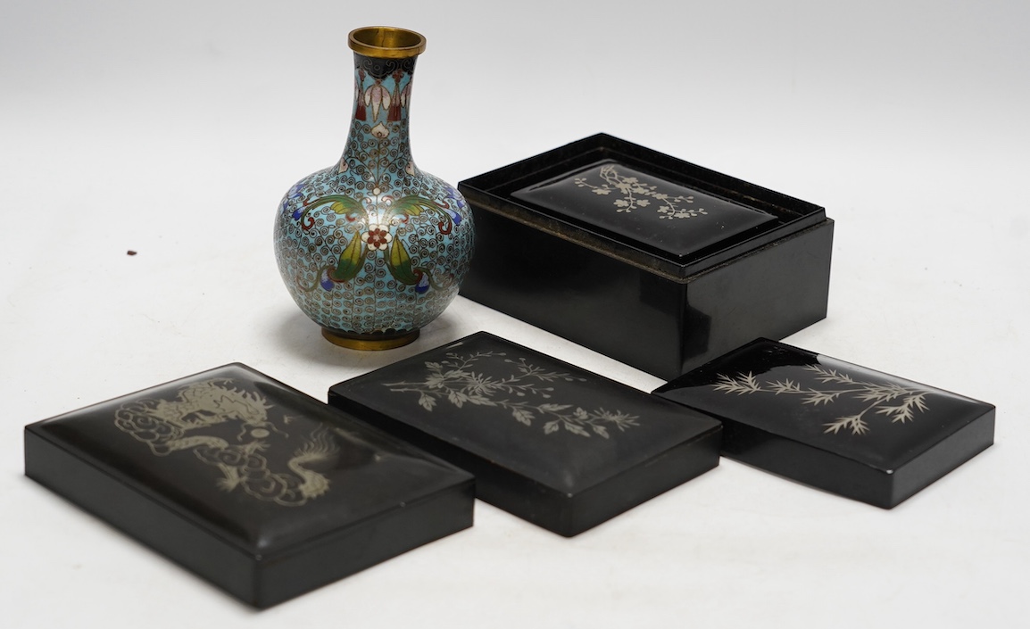 A Chinese cloisonné enamel vase, 13cm, and a set of five graduated lacquer boxes, the lids with inlaid silver decorations, largest 13.5 x 10 x 6.5cm. Condition - good
